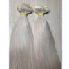 Close-up view of tape-in extensions light blonde hair #10.1
